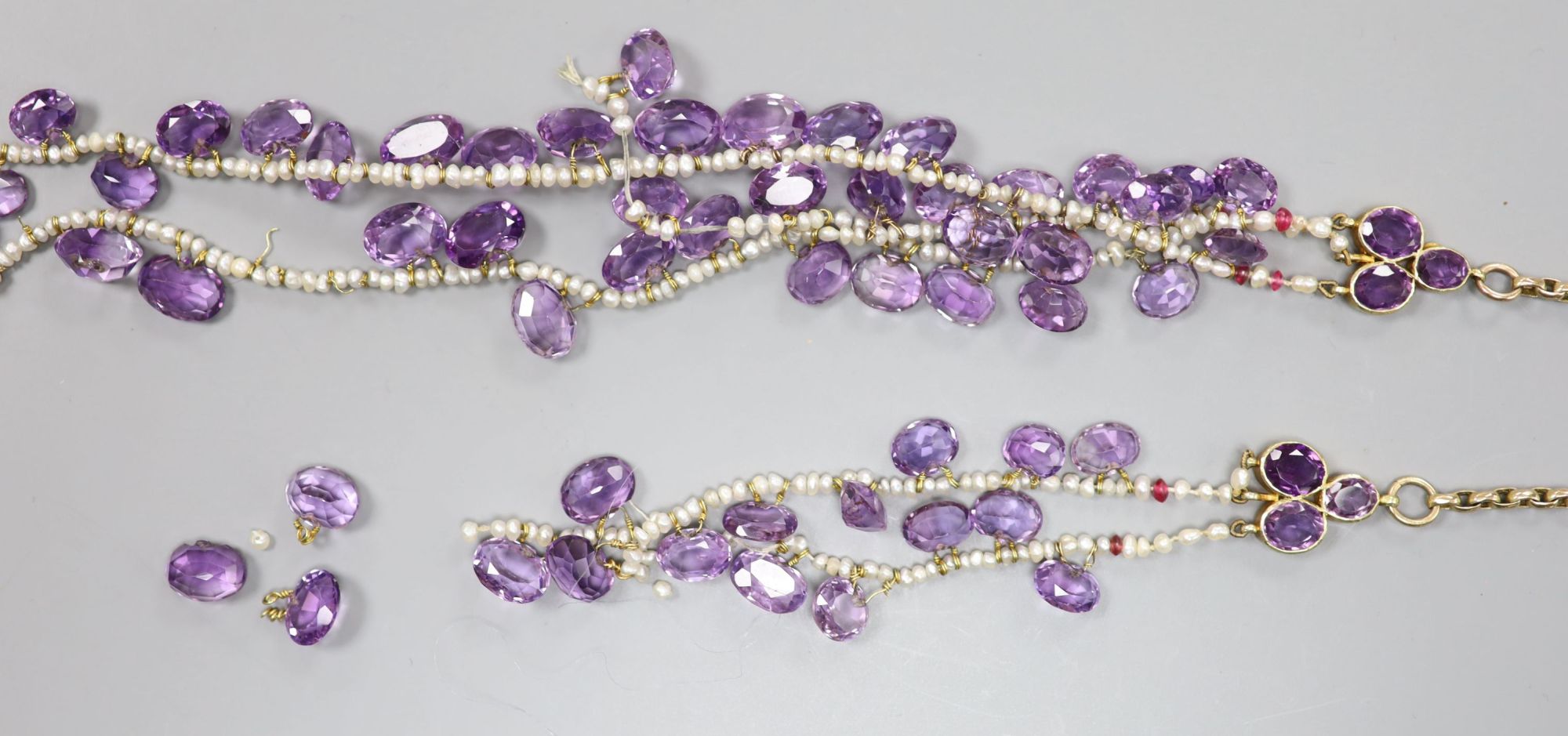 An amethyst, seed pearl and part yellow metal link necklace, with white opal set clasp(a.f.), gross weight 58 grams.